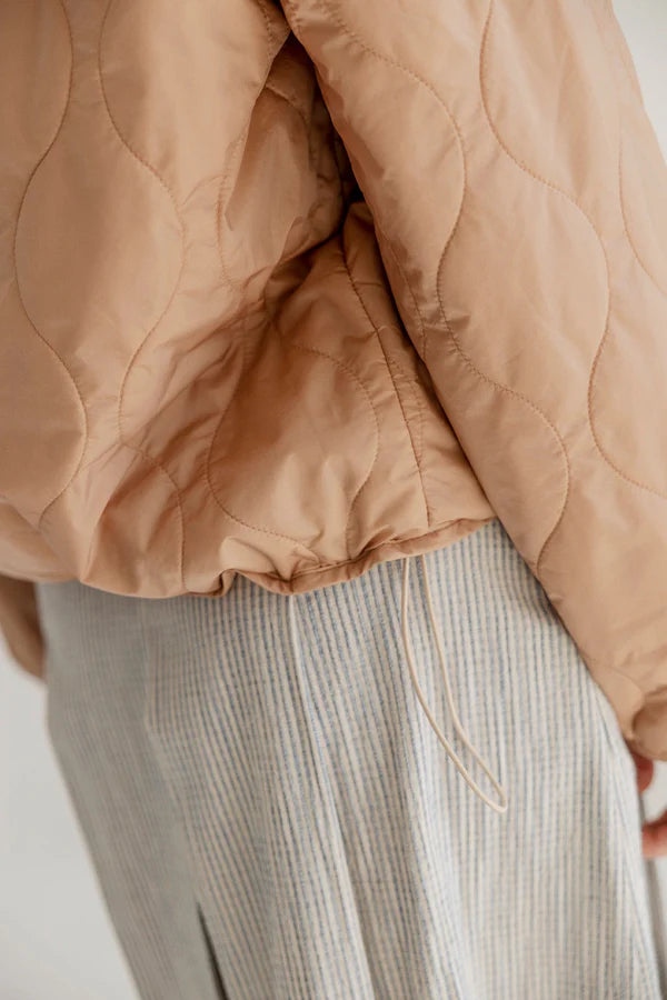 Project AJ117 Nola takki, Sand